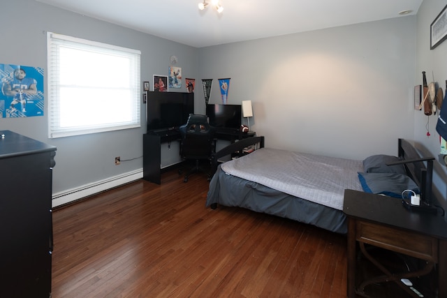 472 Central St, Marysville, MI 48040 - bedroom featuring a baseboard radiator, hardwood / wood-style flooring, and an office area