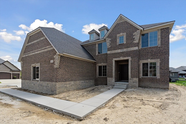 19266 Thompson Dr, Macomb, MI 48042 - view of front of property with brick siding and roof with shingles