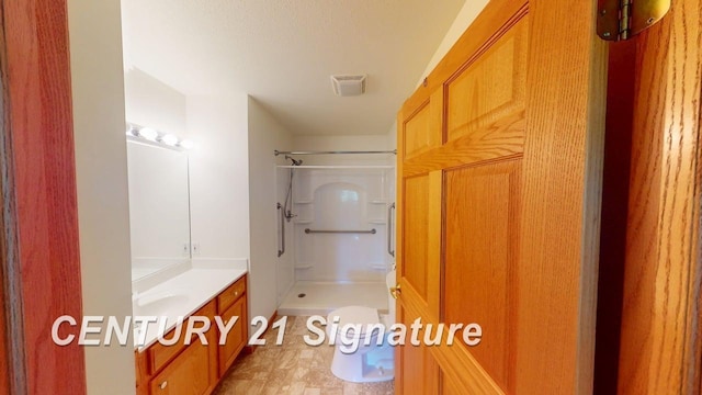 5966 Red Feather Dr, Bay City, MI 48706 - full bath featuring a stall shower and vanity