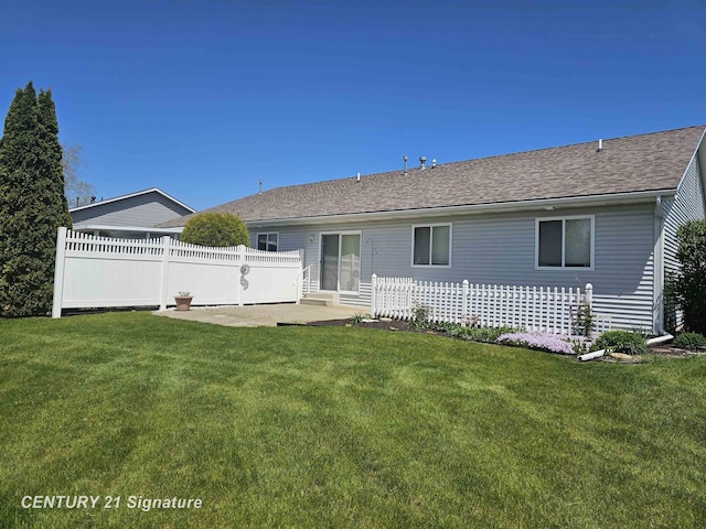 5966 Red Feather Dr, Bay City, MI 48706 - back of house with a patio area and a shingled roof