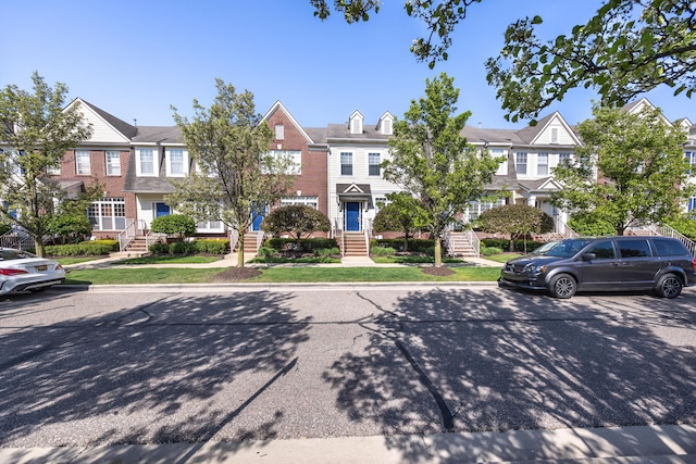 187 Center Blvd, Wixom, MI 48393 - multi unit property featuring a residential view