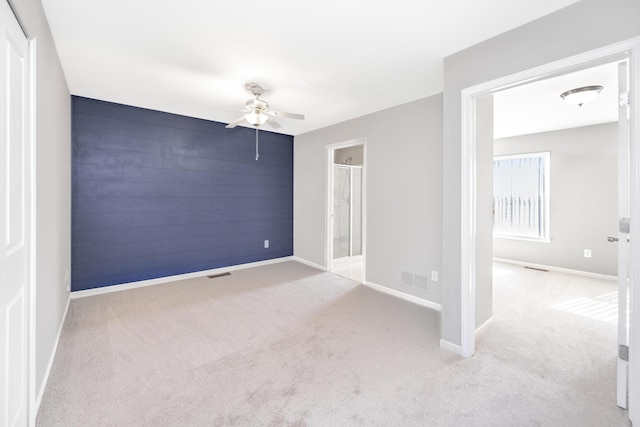 187 Center Blvd, Wixom, MI 48393 - carpeted empty room with ceiling fan and baseboards