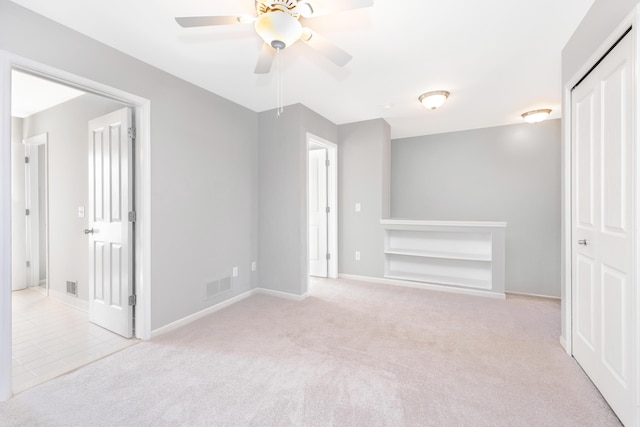 187 Center Blvd, Wixom, MI 48393 - unfurnished bedroom featuring carpet flooring, baseboards, and a ceiling fan