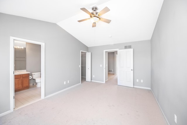 187 Center Blvd, Wixom, MI 48393 - unfurnished bedroom featuring lofted ceiling, baseboards, light carpet, a spacious closet, and ensuite bath