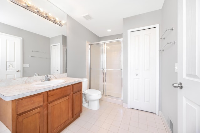 187 Center Blvd, Wixom, MI 48393 - full bath with a shower stall, tile patterned floors, vanity, and toilet