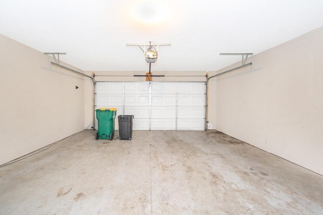 187 Center Blvd, Wixom, MI 48393 - garage featuring a garage door opener