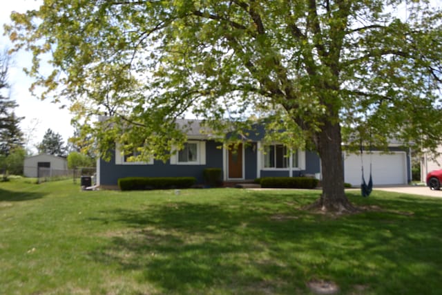 5448 Fairview Dr, Grand Blanc, MI 48439 - ranch-style house with driveway, a front yard, and a garage