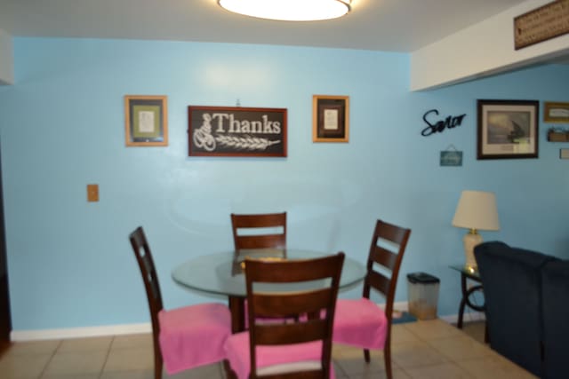 5448 Fairview Dr, Grand Blanc, MI 48439 - dining area featuring baseboards and tile patterned floors