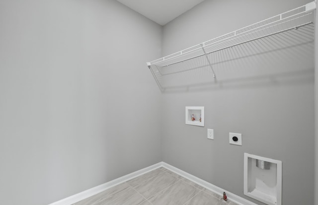 4076 Nottingham Cir, Clarkston, MI 48346 - clothes washing area with washer hookup, hookup for an electric dryer, and baseboards
