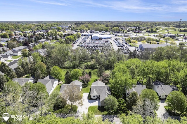aerial view of property's location with nearby suburban area