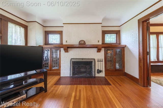 337 Chandler St, Romeo, MI 48065 - living room featuring wood finished floors, plenty of natural light, and ornamental molding