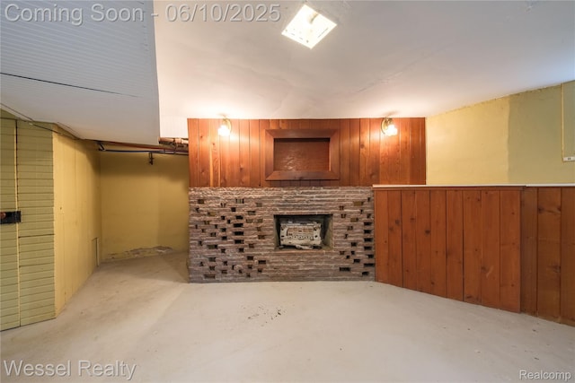 337 Chandler St, Romeo, MI 48065 - finished basement featuring wooden walls and a fireplace