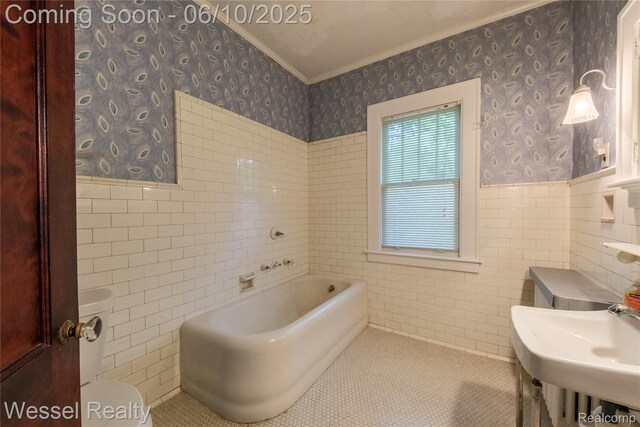 337 Chandler St, Romeo, MI 48065 - full bath with wallpapered walls, tile walls, ornamental molding, toilet, and a garden tub