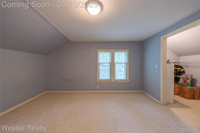 337 Chandler St, Romeo, MI 48065 - additional living space featuring vaulted ceiling, carpet floors, and baseboards