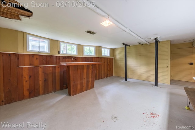 337 Chandler St, Romeo, MI 48065 - basement featuring wood walls