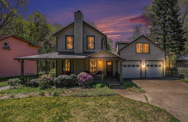 view of front of home featuring a porch, a garage, concrete driveway, and a chimney