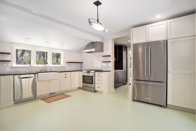 kitchen with appliances with stainless steel finishes, open shelves, a sink, wall chimney exhaust hood, and decorative backsplash