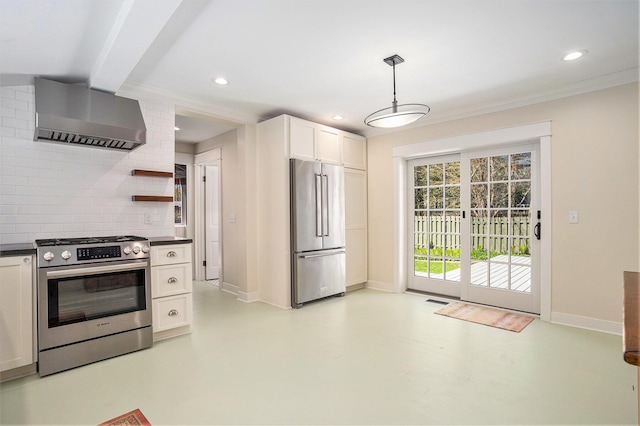 kitchen featuring appliances with stainless steel finishes, wall chimney range hood, tasteful backsplash, dark countertops, and recessed lighting