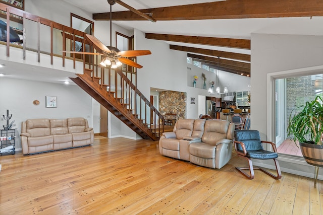 343 Shotwell, White Lake, MI 48386 - living room featuring wood-type flooring, stairway, high vaulted ceiling, beamed ceiling, and ceiling fan