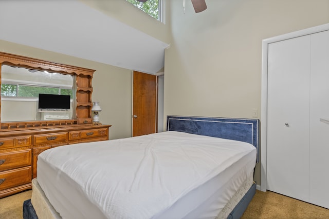 343 Shotwell, White Lake, MI 48386 - bedroom with light colored carpet, multiple windows, ceiling fan, and a high ceiling