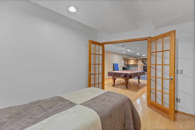343 Shotwell, White Lake, MI 48386 - bedroom featuring french doors, wood finished floors, billiards, recessed lighting, and baseboards