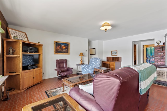 15065 Becker Dr, Mecosta, MI 49332 - living room with brick flooring and baseboards