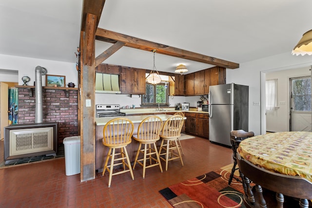 15065 Becker Dr, Mecosta, MI 49332 - kitchen with appliances with stainless steel finishes, a sink, brick patterned floors, a peninsula, and beam ceiling