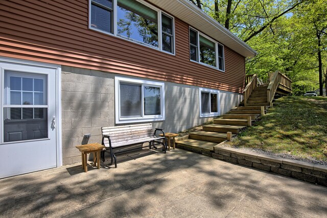 15065 Becker Dr, Mecosta, MI 49332 - rear view of house with stairs and a patio