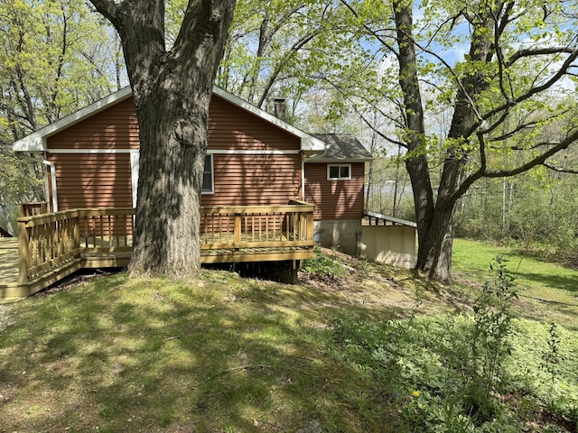 15065 Becker Dr, Mecosta, MI 49332 - back of property with a wooden deck and a yard