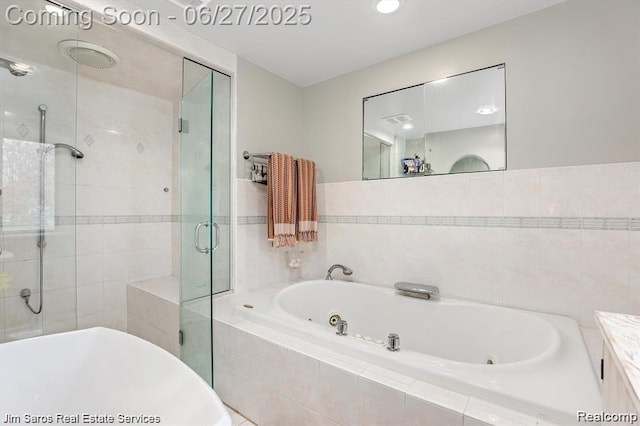 21838 Van K Dr, Grosse Pointe Woods, MI 48236 - bathroom with a jetted tub, a shower stall, and vanity