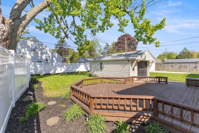 wooden terrace with an outbuilding