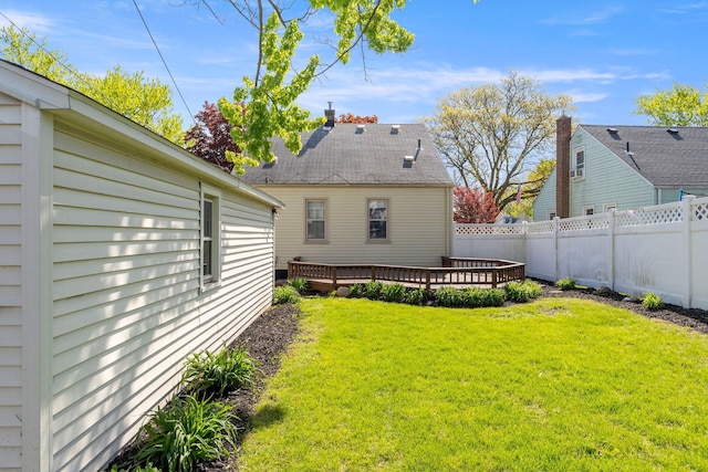 view of yard featuring a wooden deck