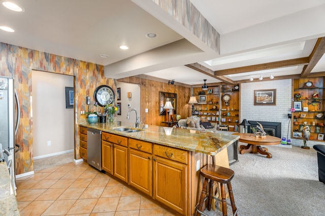 1366 E Coon Lake Rd, Howell, MI 48843 - kitchen with a sink, open floor plan, stainless steel appliances, light carpet, and beam ceiling