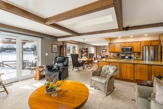 1366 E Coon Lake Rd, Howell, MI 48843 - living room featuring light colored carpet, beamed ceiling, and recessed lighting