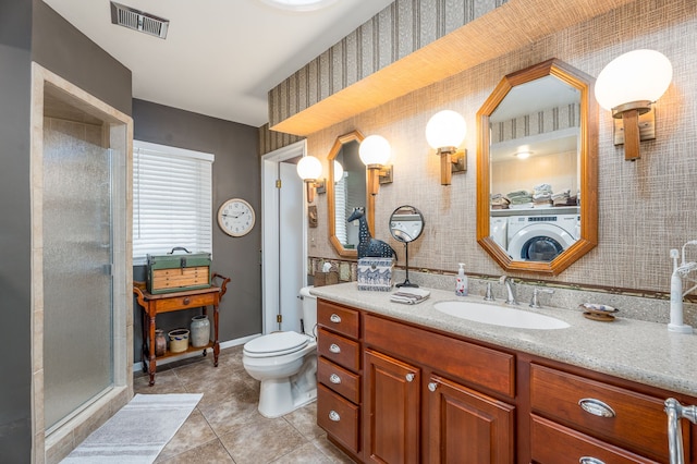 1366 E Coon Lake Rd, Howell, MI 48843 - full bath featuring tile patterned floors, washer / dryer, toilet, vanity, and wallpapered walls