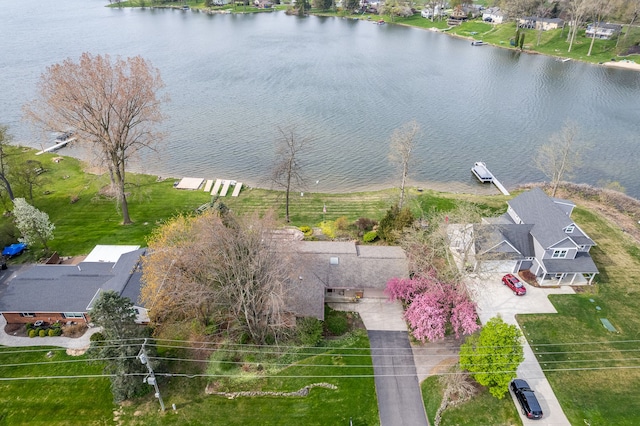 1366 E Coon Lake Rd, Howell, MI 48843 - aerial view of residential area with a large body of water