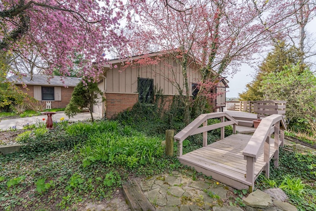 1366 E Coon Lake Rd, Howell, MI 48843 - view of yard with a deck
