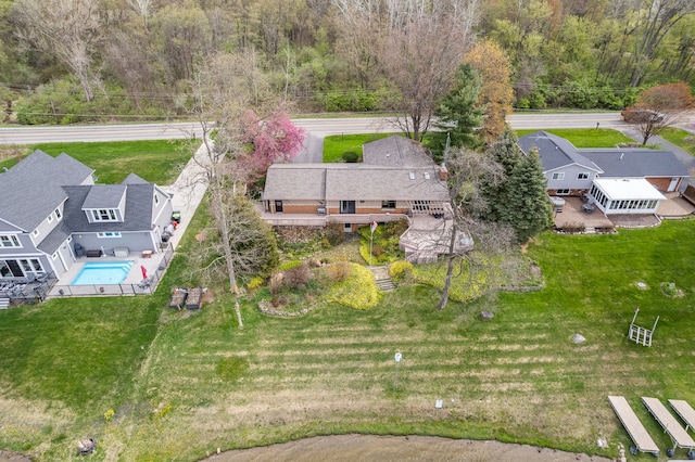 1366 E Coon Lake Rd, Howell, MI 48843 - view of subject property with a pool