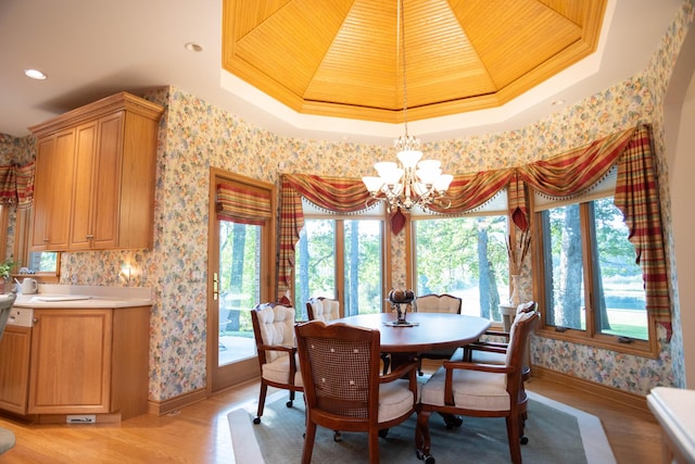 2865 Vw Ave E, Vicksburg, MI 49097 - dining room with a chandelier, wallpapered walls, light wood finished floors, baseboards, and recessed lighting