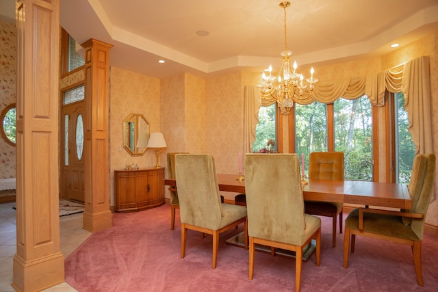 2865 Vw Ave E, Vicksburg, MI 49097 - dining space featuring a tray ceiling, a chandelier, and wallpapered walls