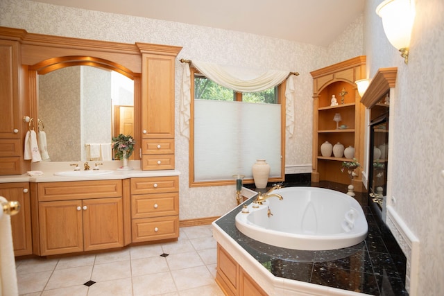 2865 Vw Ave E, Vicksburg, MI 49097 - bathroom with wallpapered walls, a garden tub, vanity, tile patterned floors, and baseboards
