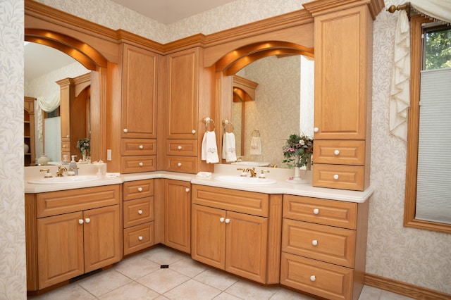 2865 Vw Ave E, Vicksburg, MI 49097 - bathroom featuring wallpapered walls, double vanity, and tile patterned floors