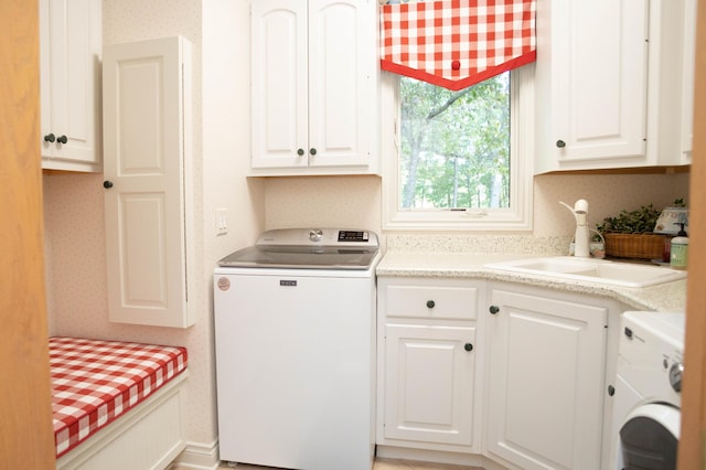 2865 Vw Ave E, Vicksburg, MI 49097 - washroom featuring cabinet space and independent washer and dryer