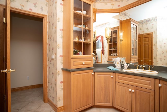 2865 Vw Ave E, Vicksburg, MI 49097 - bathroom with wallpapered walls, tile patterned flooring, vanity, and baseboards