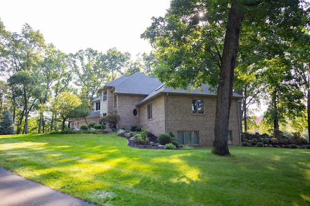 2865 Vw Ave E, Vicksburg, MI 49097 - view of home's exterior featuring a yard and brick siding