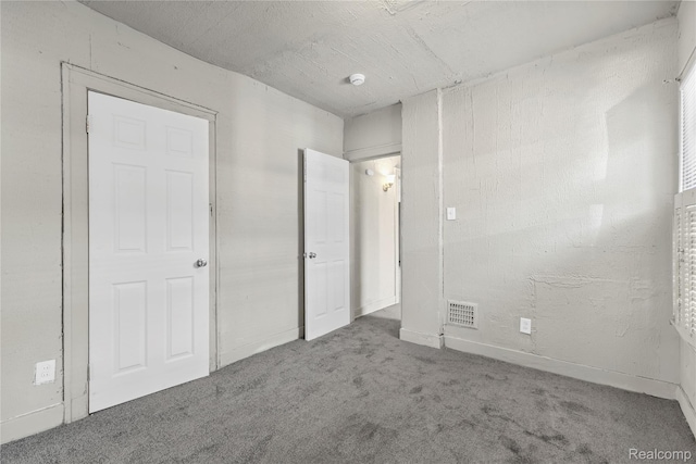 5856 Barrett St, Detroit, MI 48213 - unfurnished bedroom with carpet and baseboards