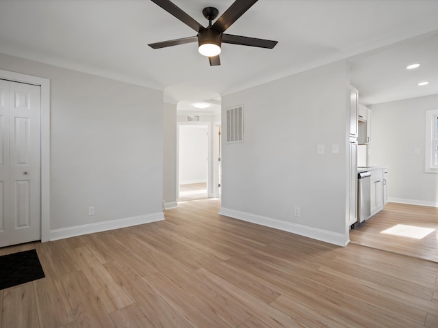 86 E Barrett Ave, Madison Heights, MI 48071 - unfurnished living room featuring a ceiling fan, light wood finished floors, baseboards, and recessed lighting