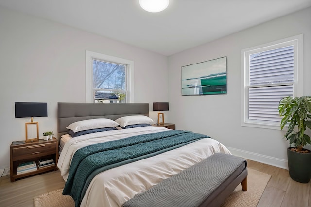 86 E Barrett Ave, Madison Heights, MI 48071 - bedroom with light wood-type flooring and baseboards