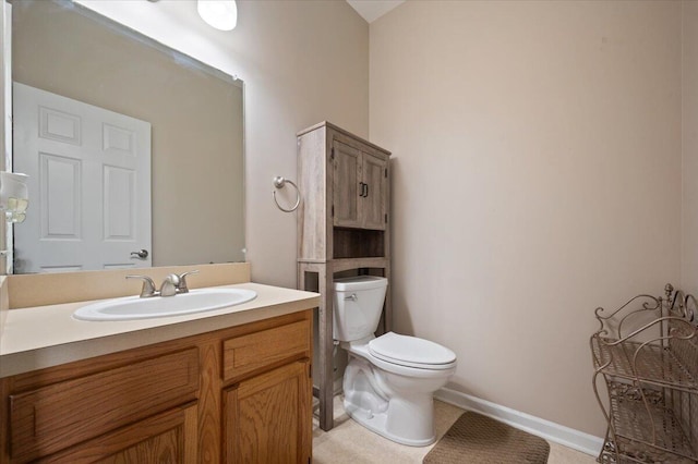 215 Caribou Run, Dundee, MI 48131 - bathroom with toilet, vanity, and baseboards