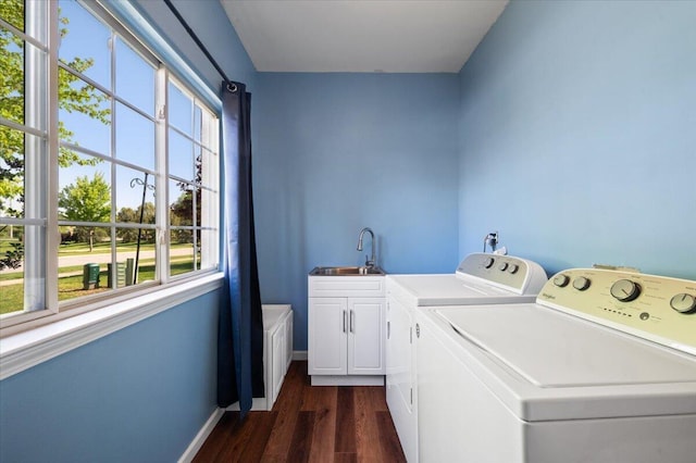 215 Caribou Run, Dundee, MI 48131 - washroom featuring cabinet space, dark wood-type flooring, washer and dryer, and baseboards
